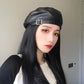 leather beret on model in black side view 
