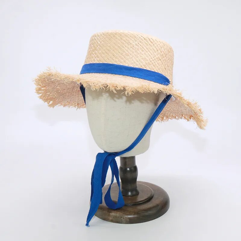 Mom and Daughter Matching Hats in bright blue on a stand