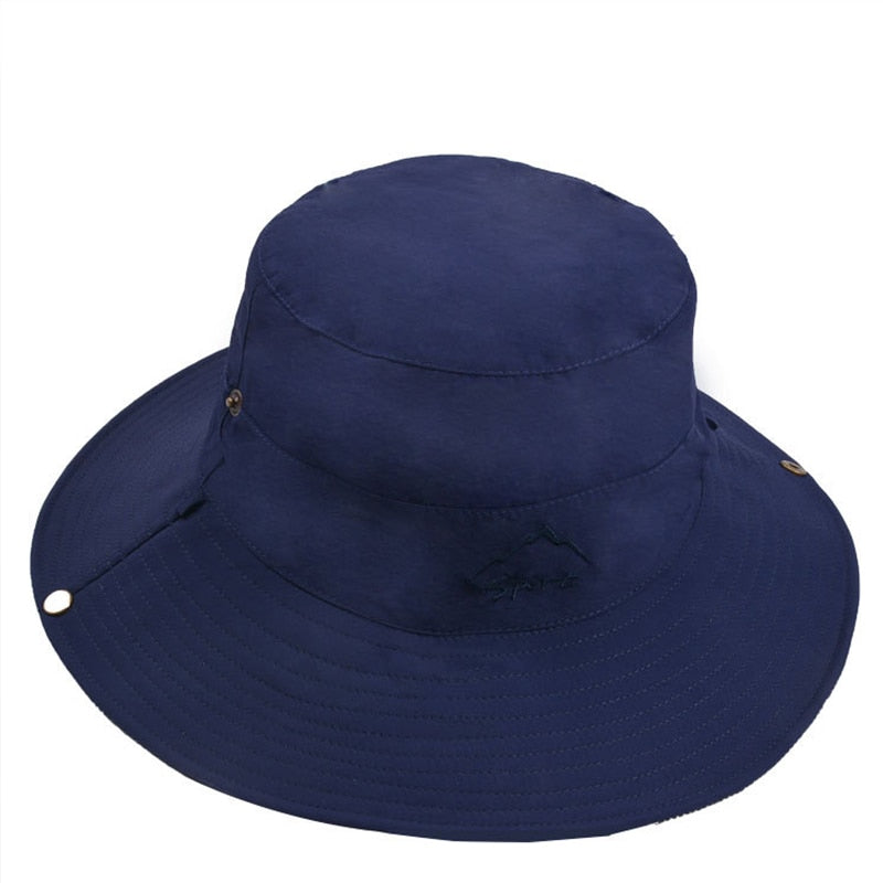 reversible bucket hat showing blue solid color side