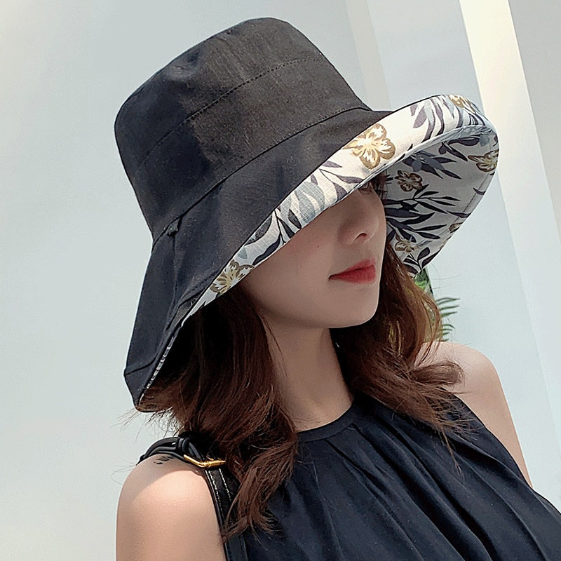 floral bucket hat on model in black