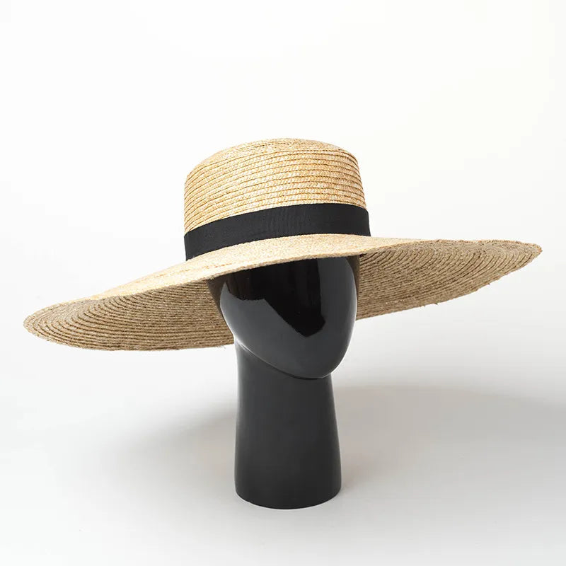 straw beach hat on stand showing front of hat 