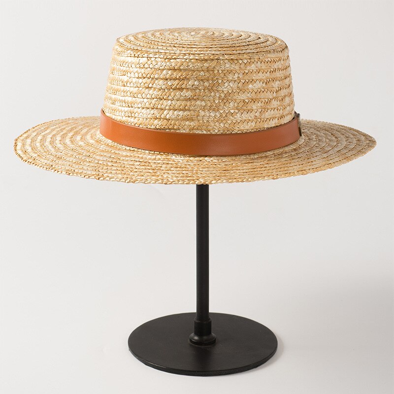 sun hat with ribbon on a stand showing front view of hat