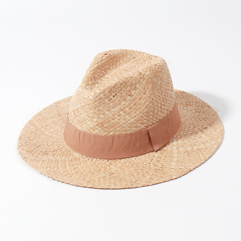 Panama Sun Hat on white background with tan ribbon