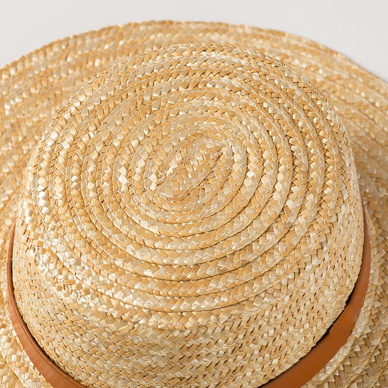sun hat with ribbon showing top of hat