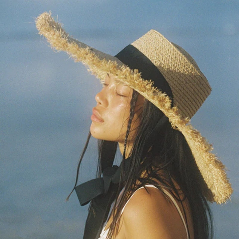 wide brim sun hat on model with closeup of hat