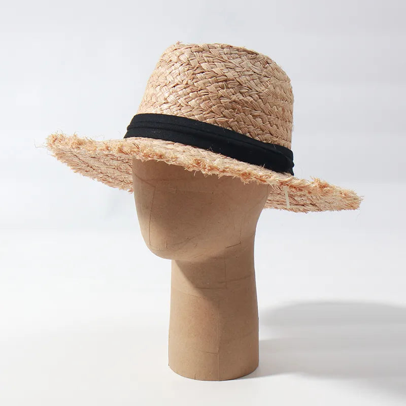 summer straw hat on a stand showing front view 