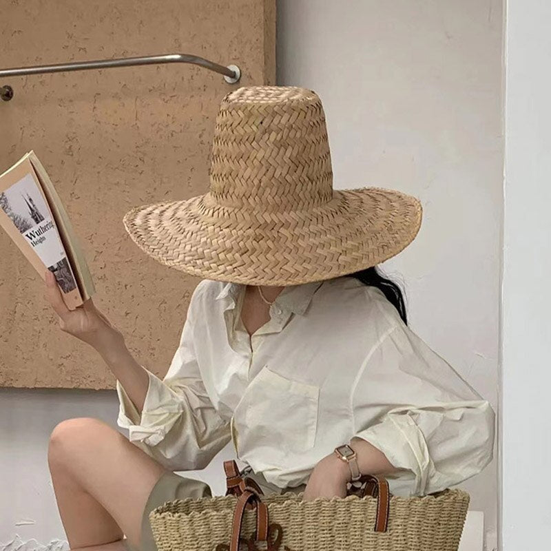 womens straw sun hat on model showing high hat