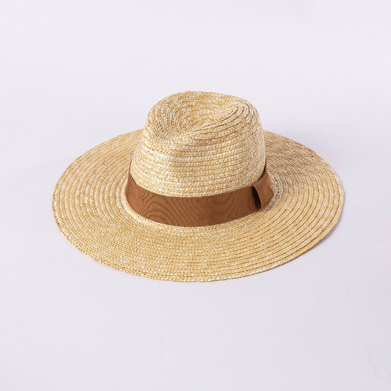 straw hat with ribbon in tan