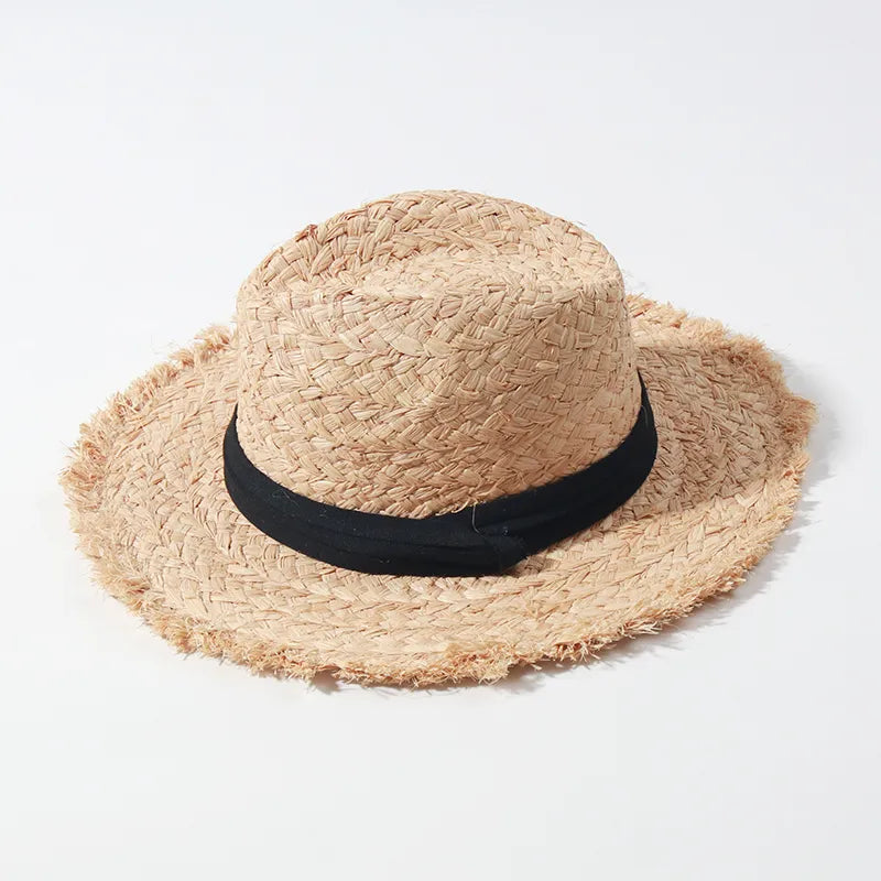 summer straw hat on white background showing entire hat 