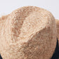 summer straw hat showing top of hat 