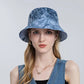 Tie Dye Bucket Hat on model in blue front view 