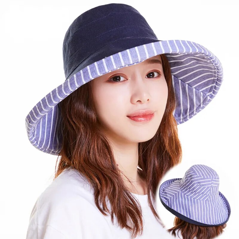 brimmed sun hat in blue on model