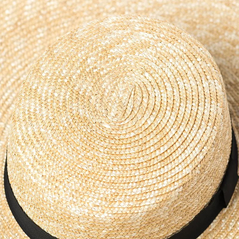 straw beach hat showing close up of the straw hat 