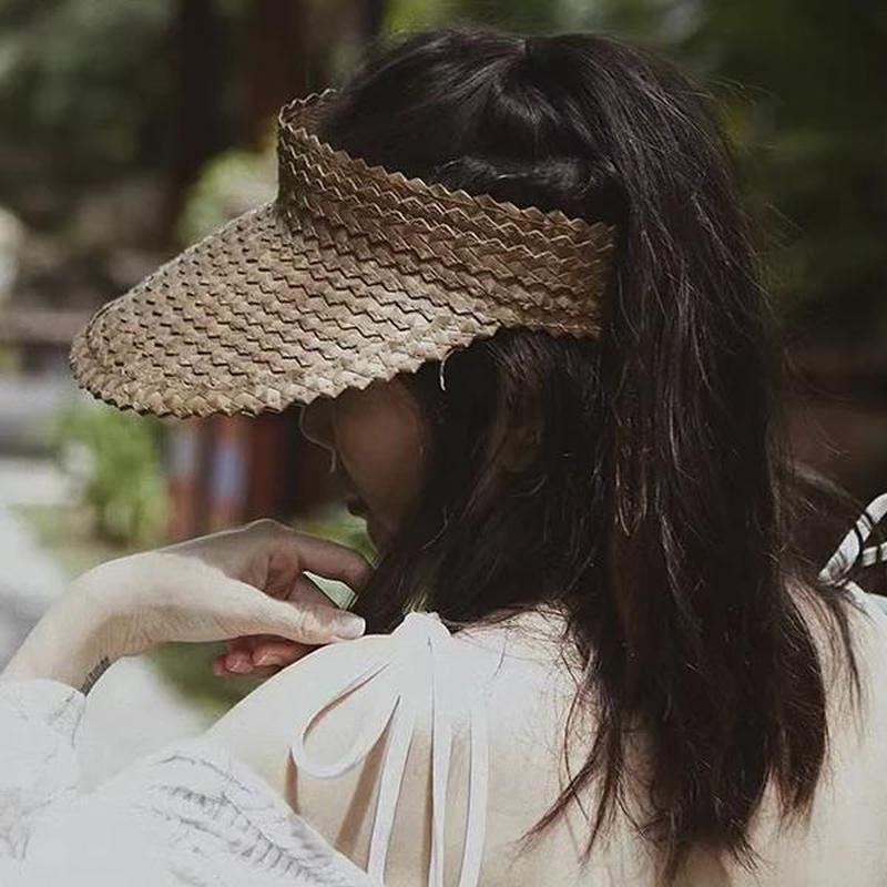 raffia visor in tan on model