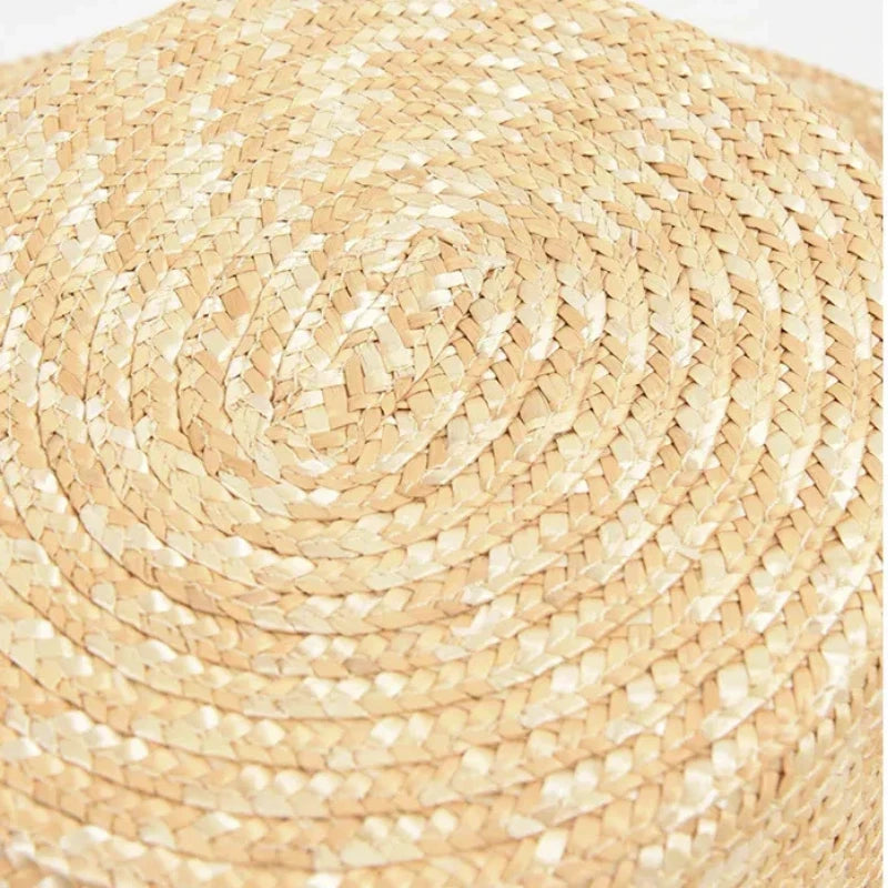 straw hat with pearl chain showing closeup of top of hat