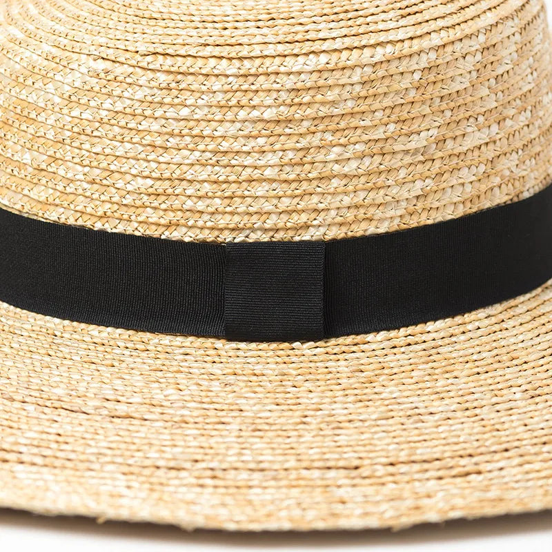 straw beach hat showing close up of the black band on hat 