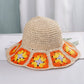 knit bucket hat with orange flowers 