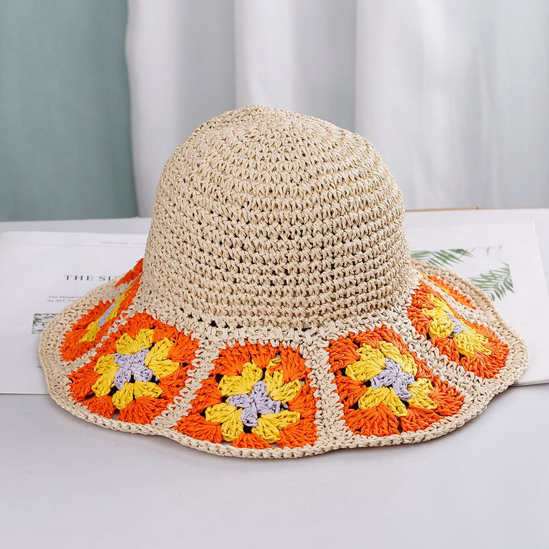 knit bucket hat with orange flowers 