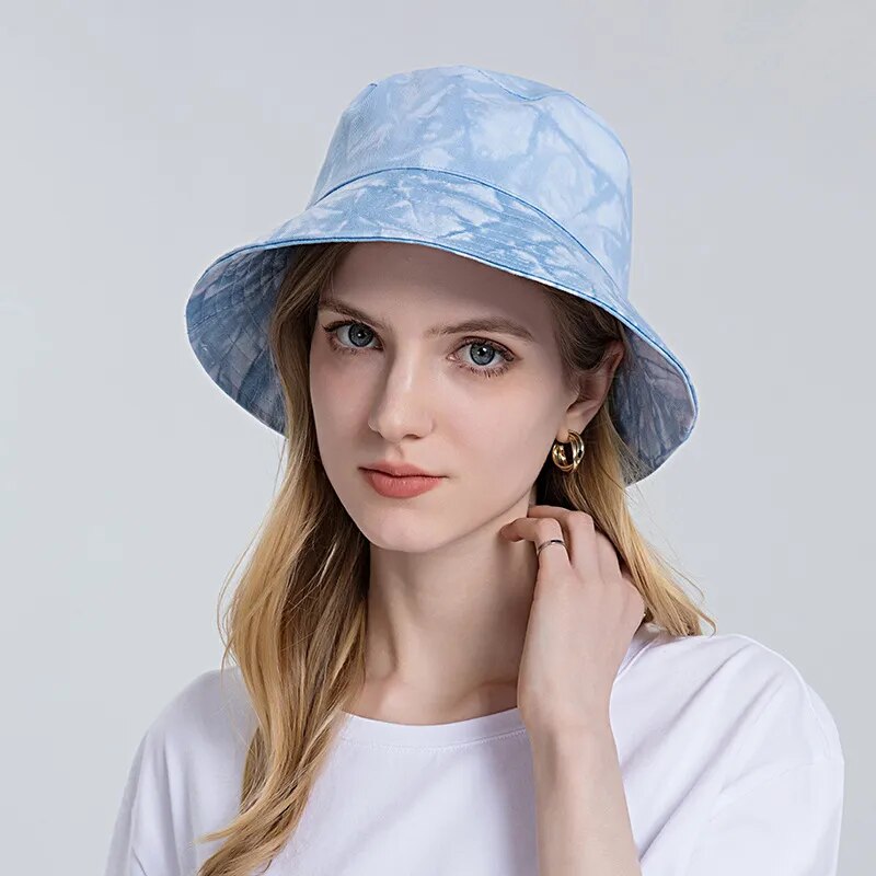 Tie Dye Bucket Hat on model in blight blue 