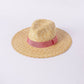 straw hat with ribbon in pink
