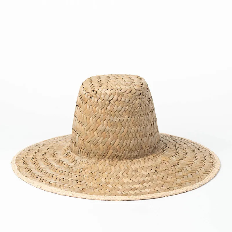 womens straw sun hat on white background