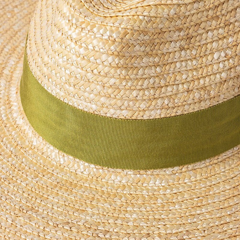 straw hat with ribbon closeup of ribbon