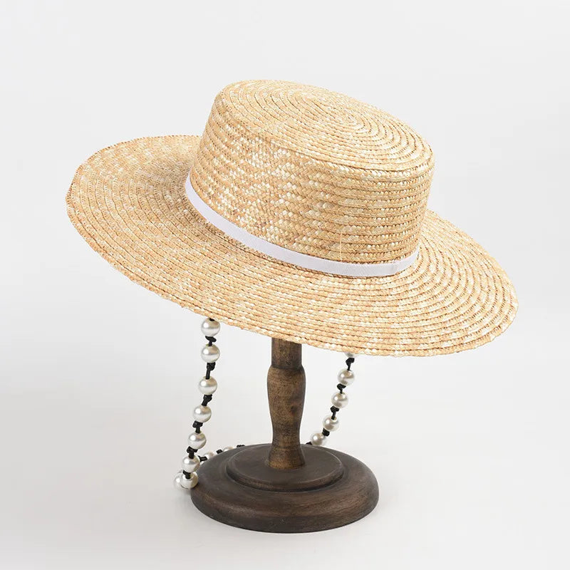 straw hat with pearl chain showing white ribbon hat on stand side view