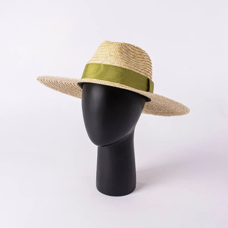 straw hat with ribbon on a stand front view 