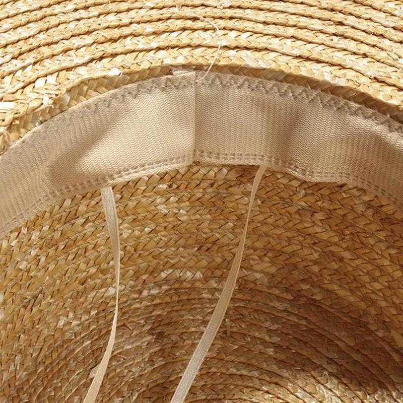 Summer Straw Flat Hat With Wide Brim And Black Ribbon