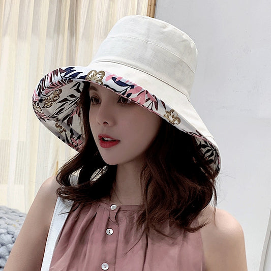 floral bucket hat on model in gray