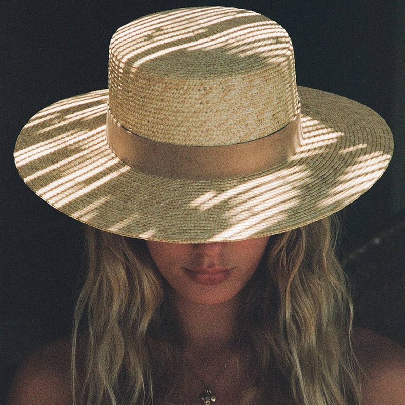 womens sun hat on a model with a close up of the hat front view