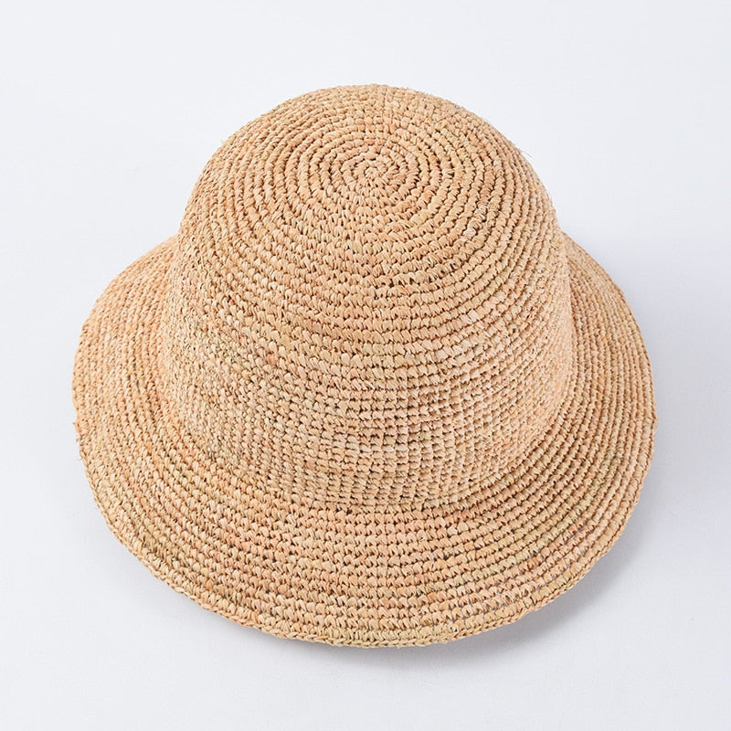 crochet bucket hat on white background showing top of hat