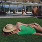 womens sun hat on a model who is sleeping with the hat covering her face