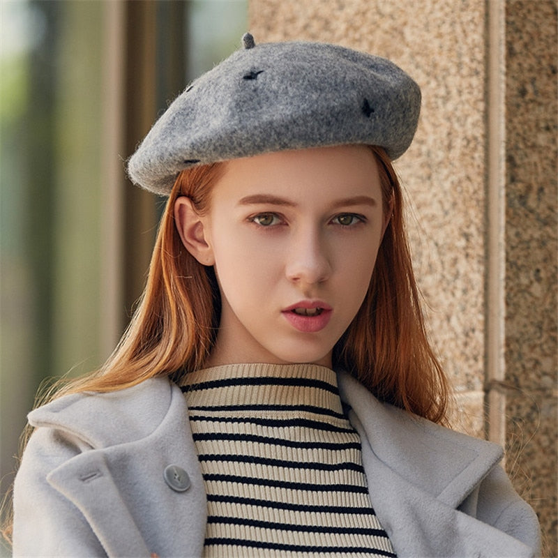 french beret hat on model in gray front view 