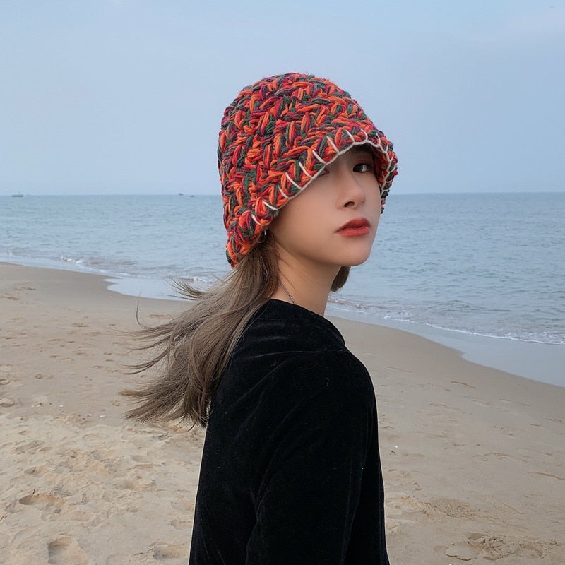 Knitted Bucket Hat on model at beach