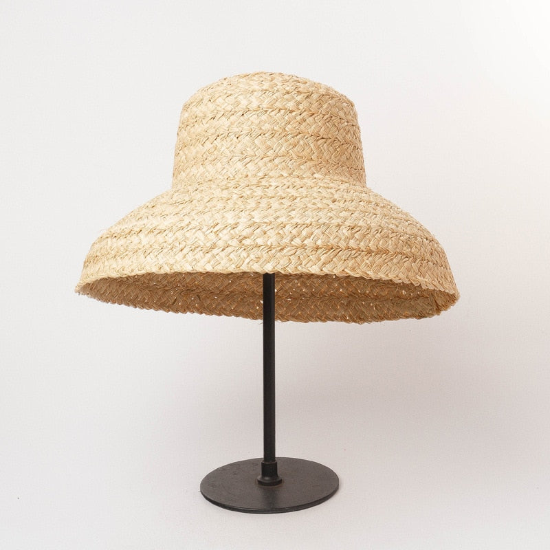 raffia bucket hat on stand showing hat