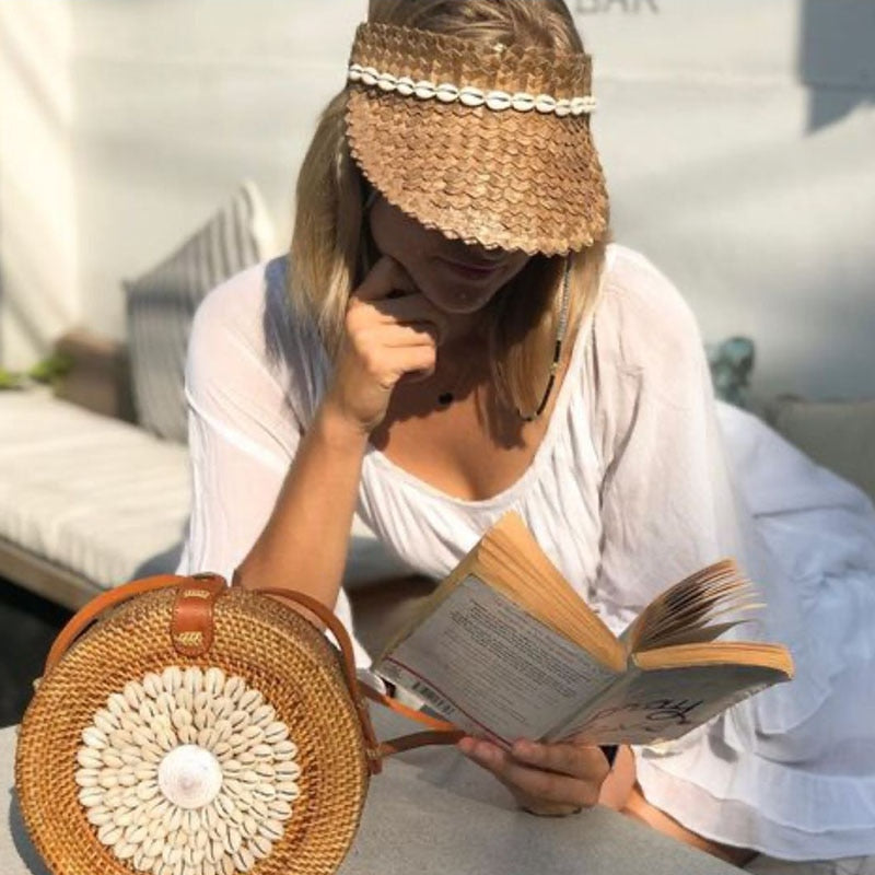 Sun Visor Hat  on model reading a book